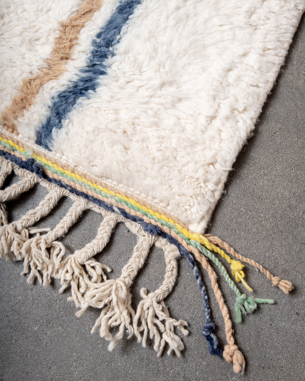 Modern, designer, handcrafted Berber rug from Morocco. Beniourain carpet with beautiful colours and patterns and fluffy wool texture.